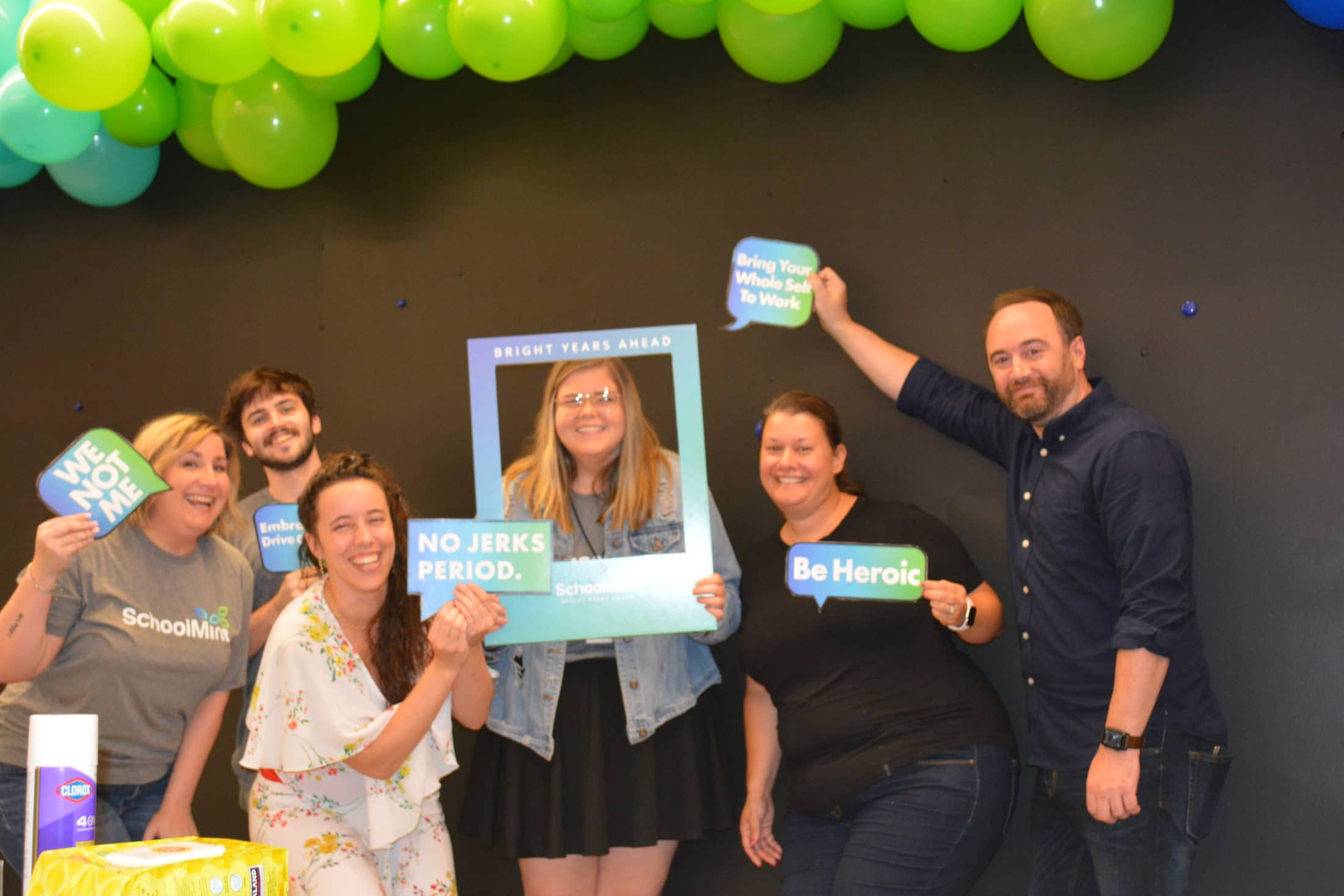 SchoolMint employees photo op re-opening