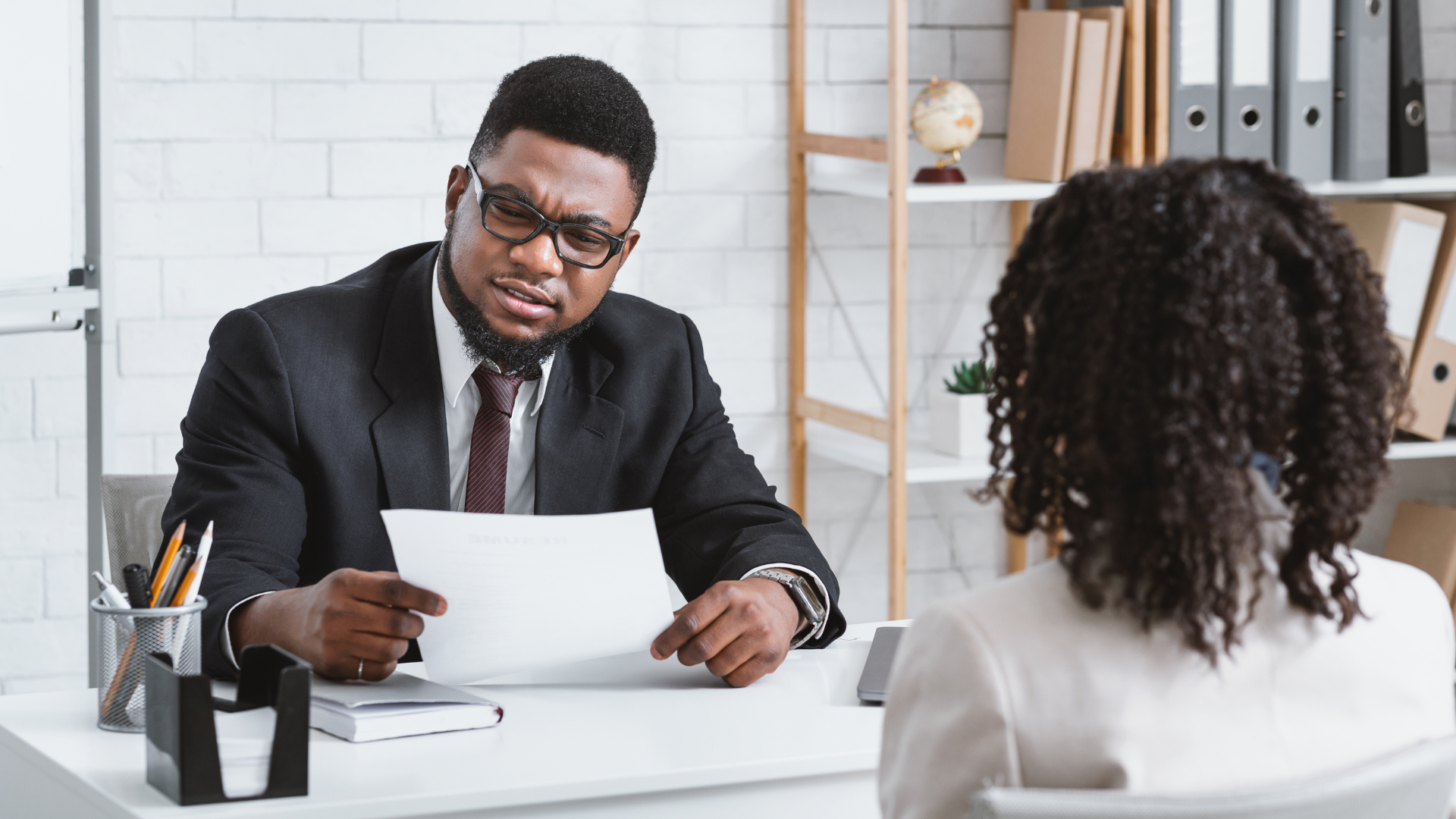 a teacher and an HR recruiter in an interview