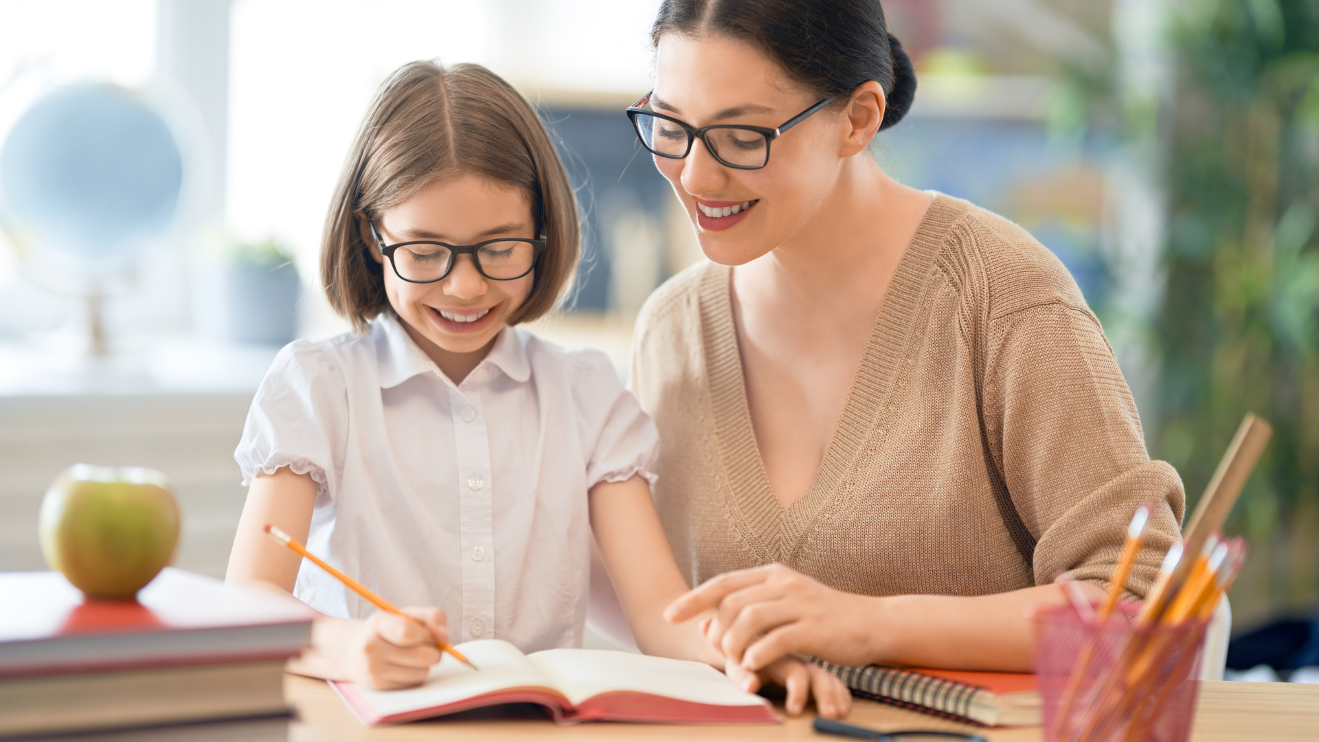 girl-with-teacher-in-classroom-2021-08-26-15-30-09-utc