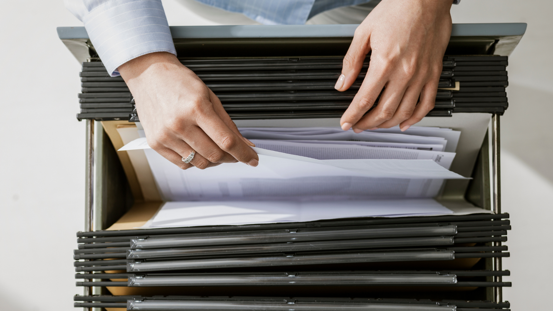 office-worker-searching-files-in-the-archive-2021-08-26-22-39-57-utc