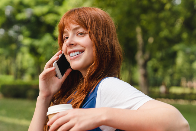 school parent ambassador on the phone with another parent