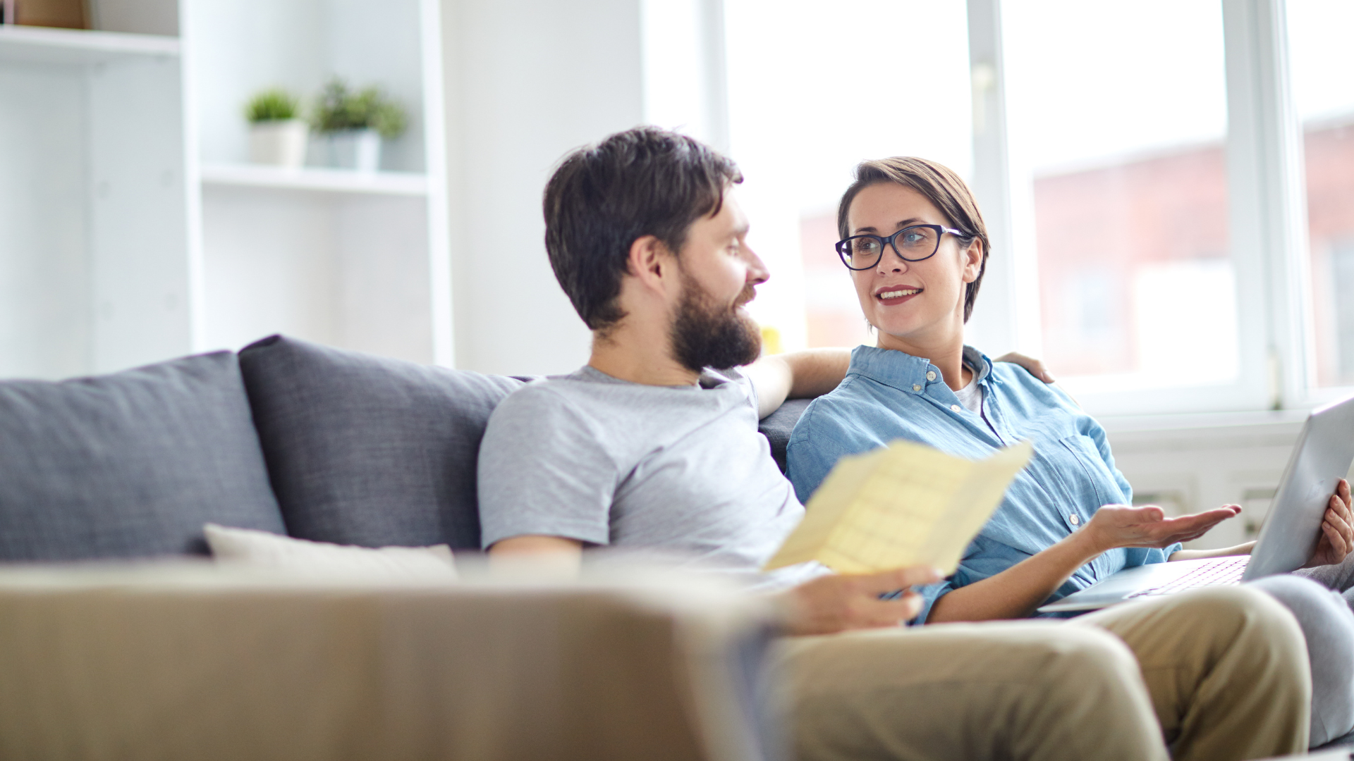 two parents discussing school satisfaction survey questions